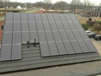 /album/foto-album/zwarte-zonnepanelen-op-een-bedrijfsdak-jpg/